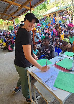 Volunteer RN Liz during triage